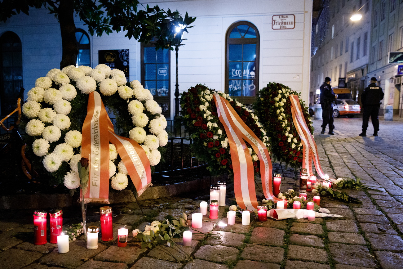 wreaths and candles at site of Vienna attack
