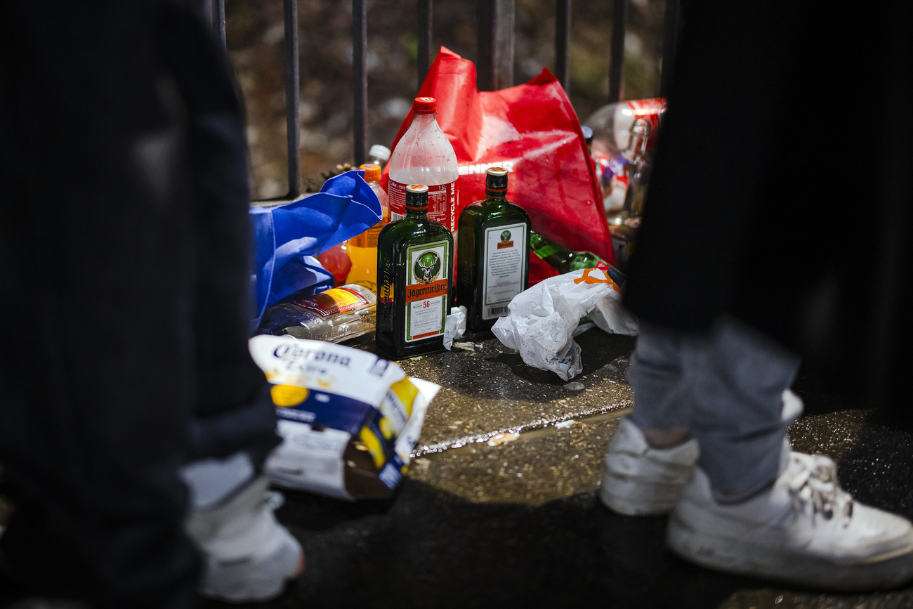 bottles of alcohol on the ground