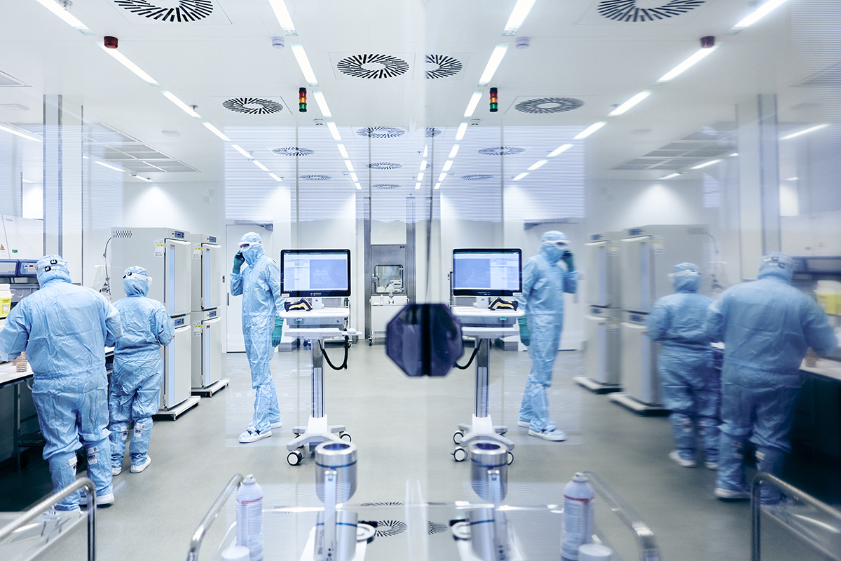 Novartis workers in lab.