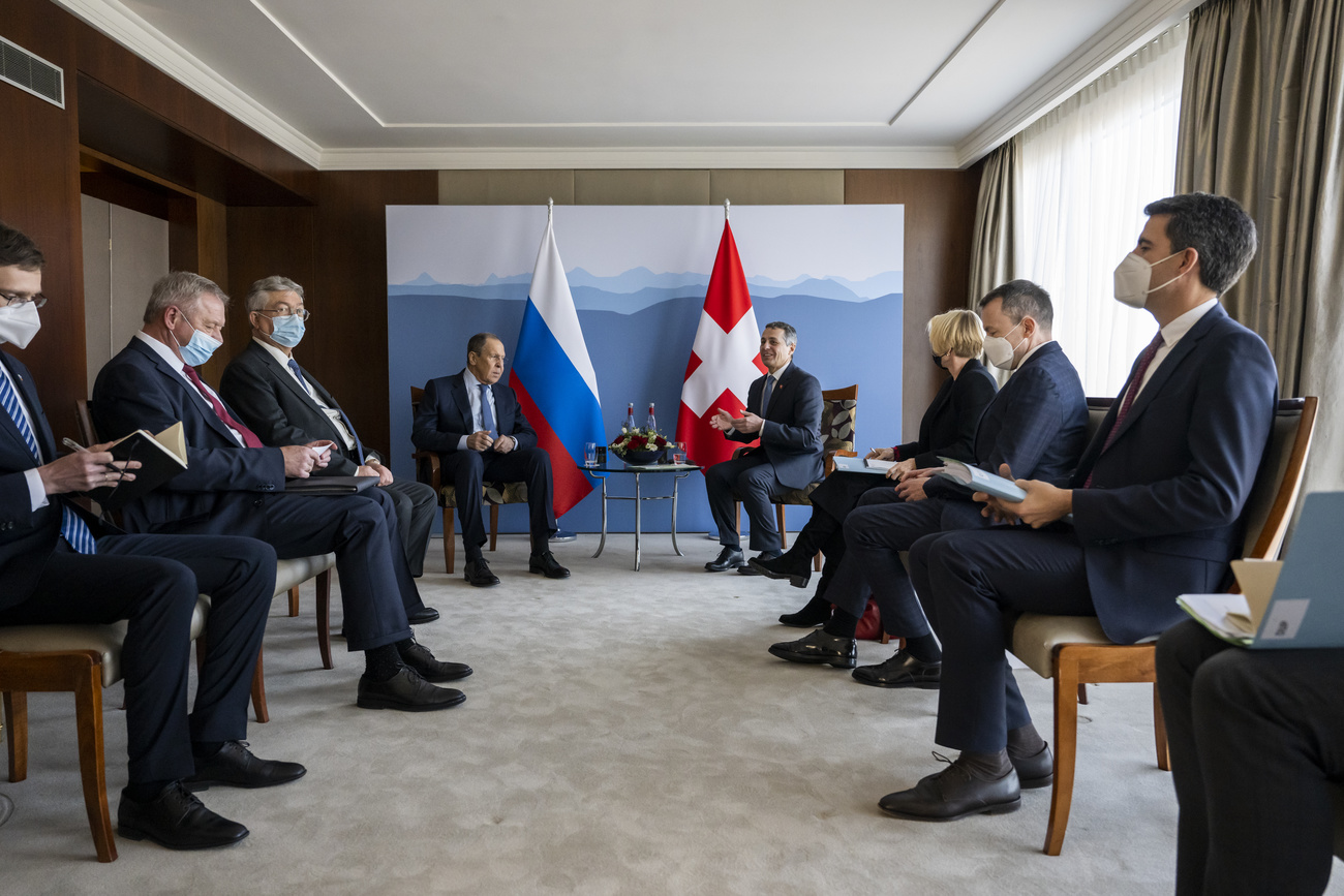 Diplomats from Russia and Switzerland in a meeting room
