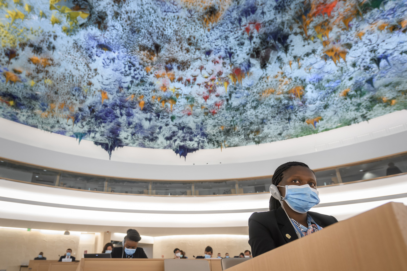 Angolan delegate in HRC conference room during racism debate