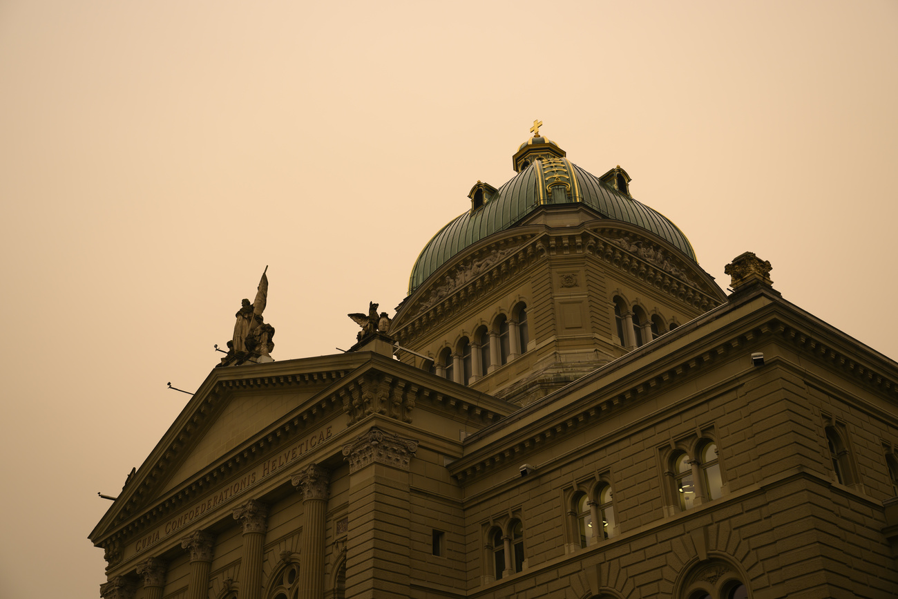 ochre sky above swiss parliament
