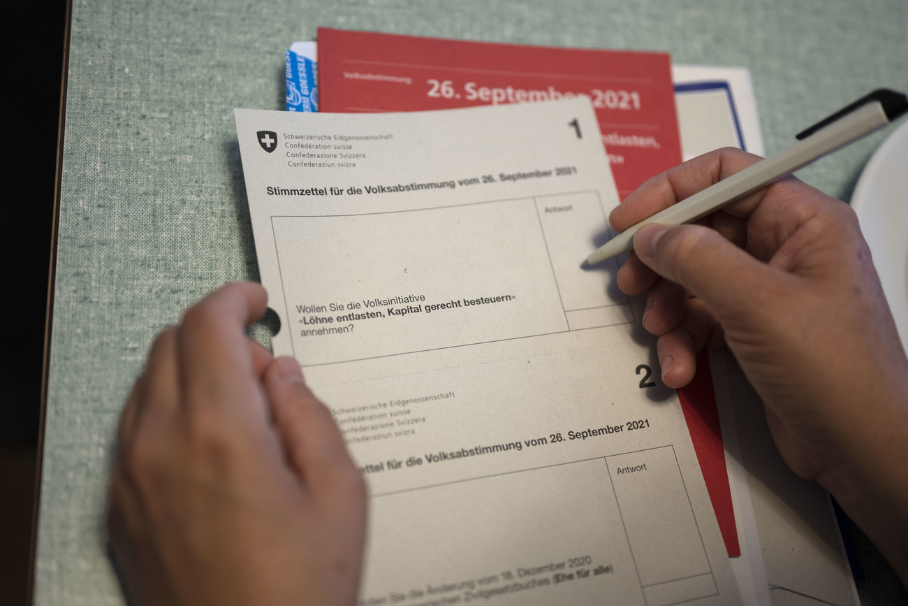 filling out a ballot paper