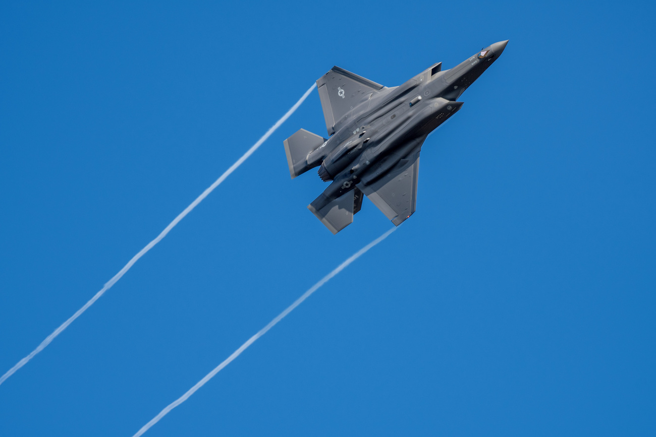fighter jet in blue sky