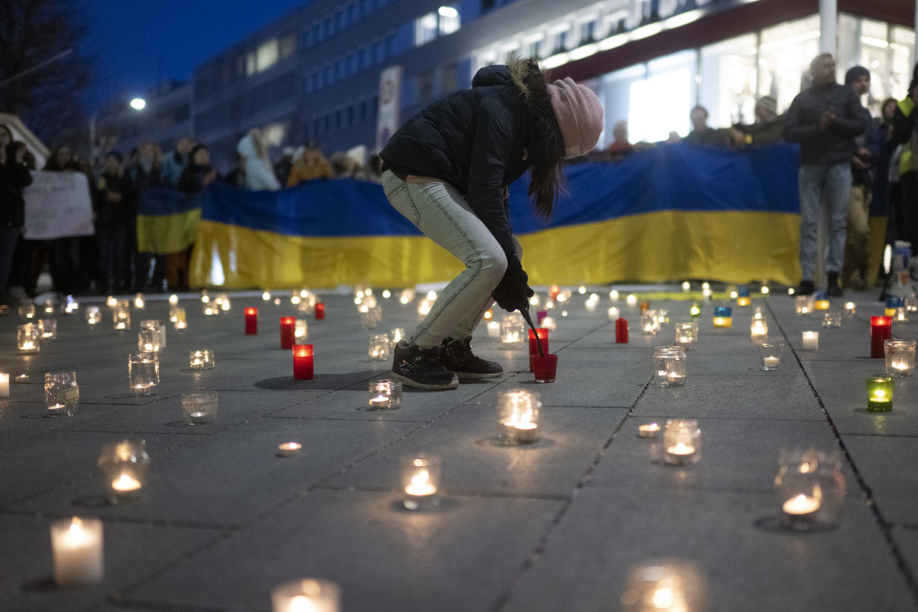 candele accese su asfalto