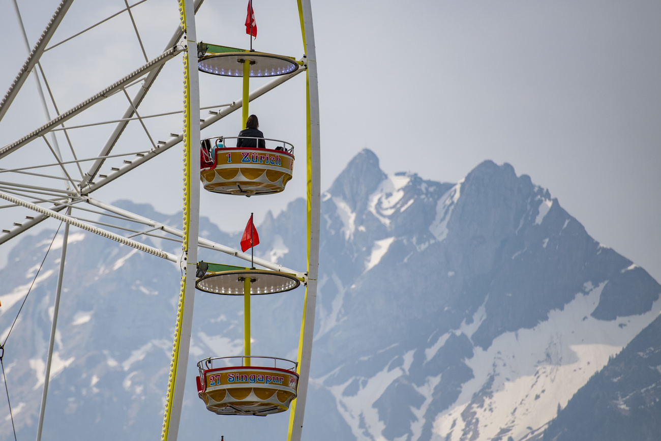 big wheel in front of mountains