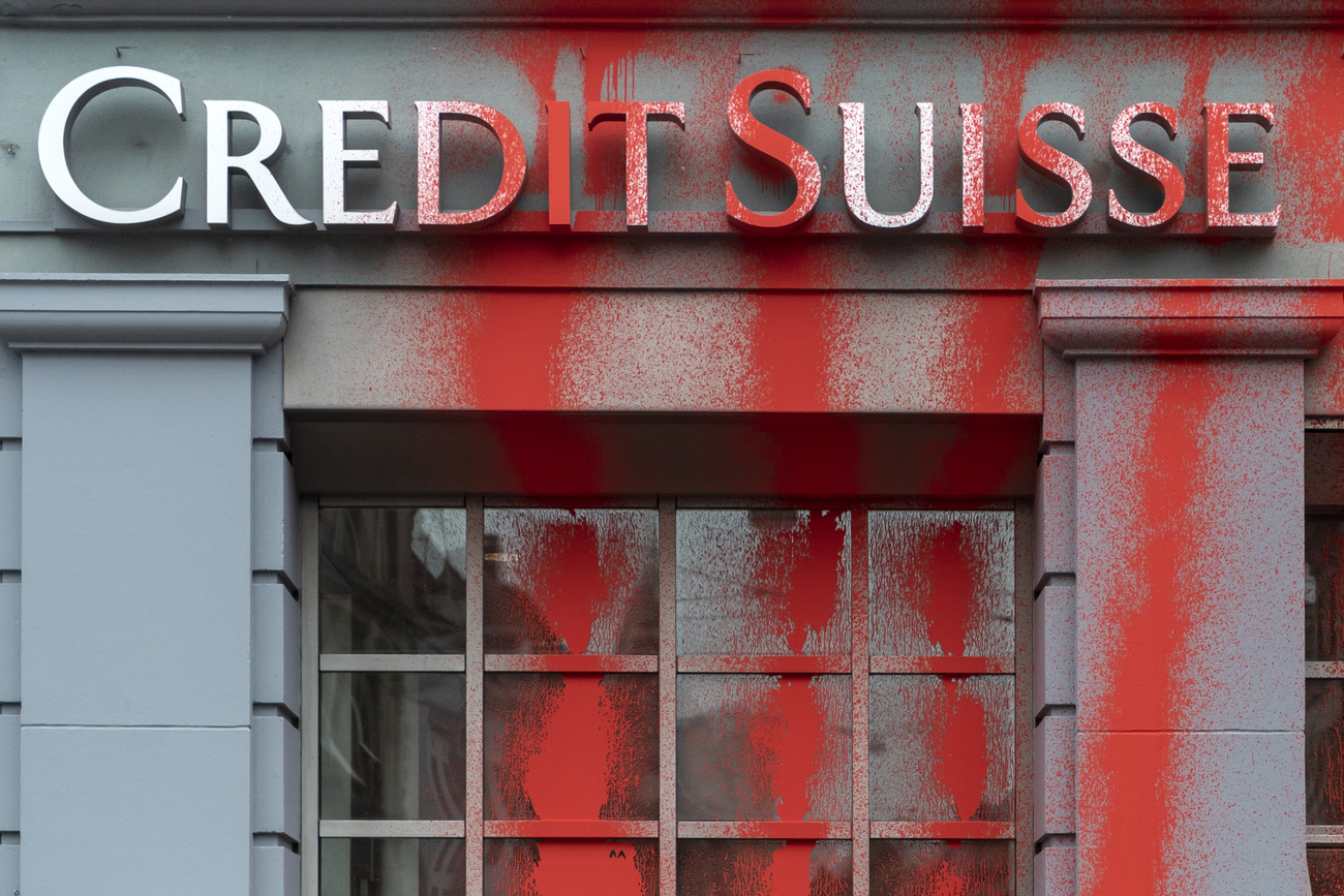 Credit Suisse logo daubed with red paint