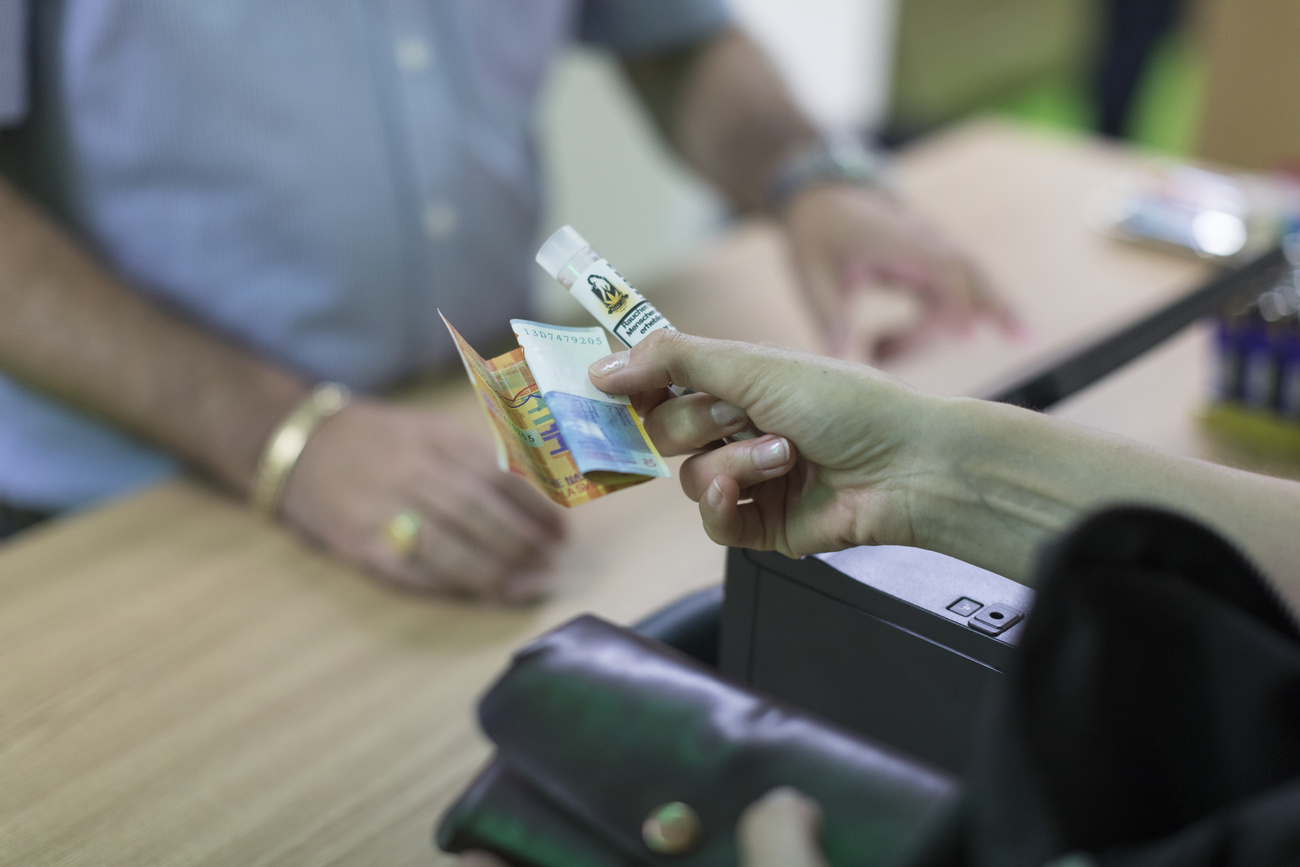 Customer paying a ready-made joint in a shop