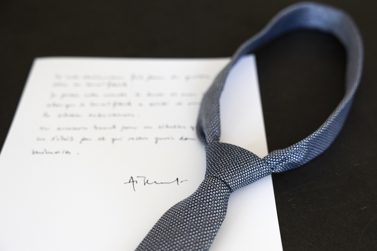 tie and note on paper