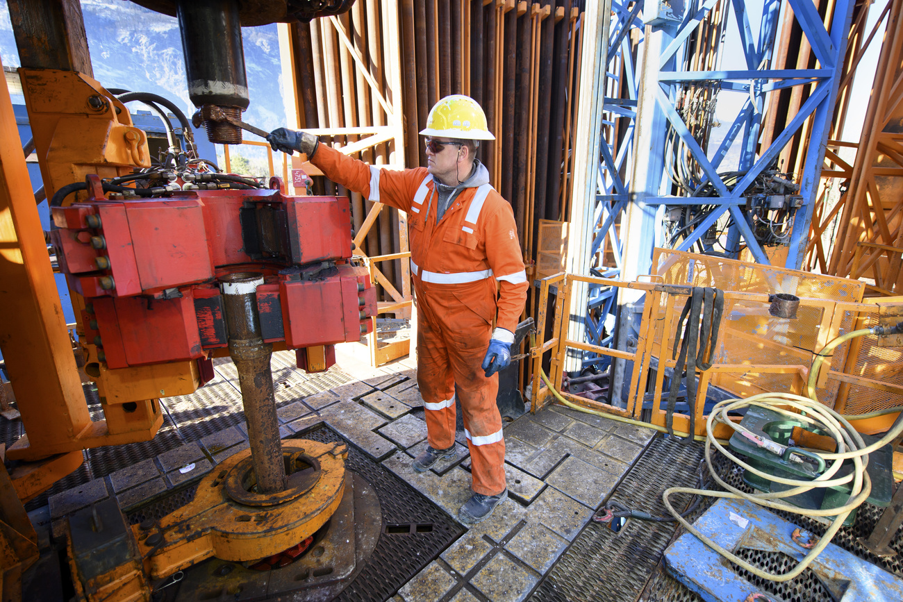 Man on drilling rig at Lavey-les-Bains.