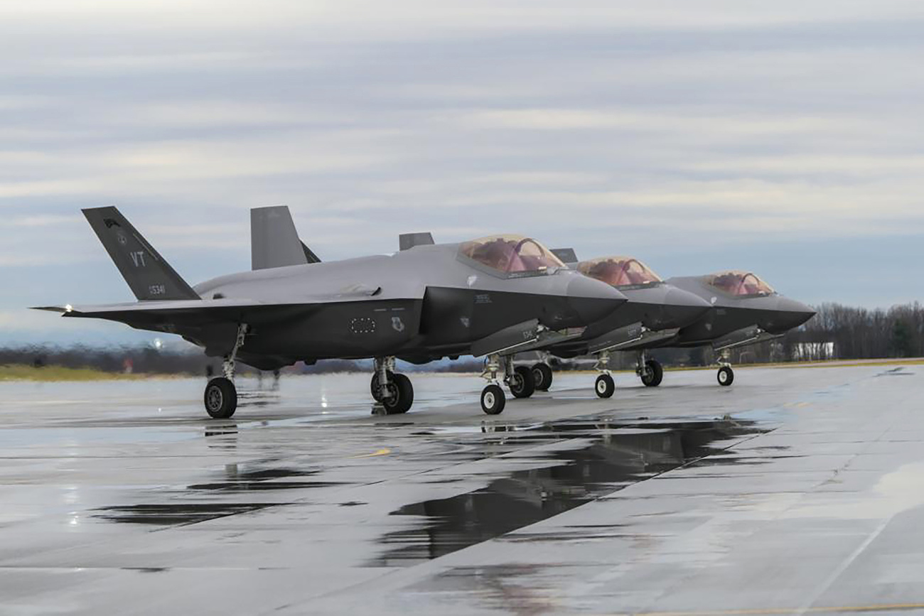 Row of three F-35 fighter jets on tarmac
