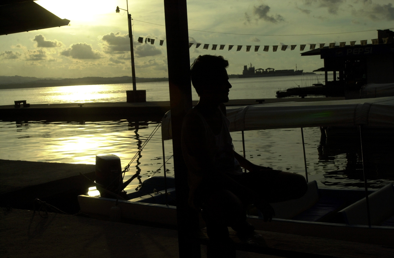 Man sitting in Puerto Barrios, Guatemala