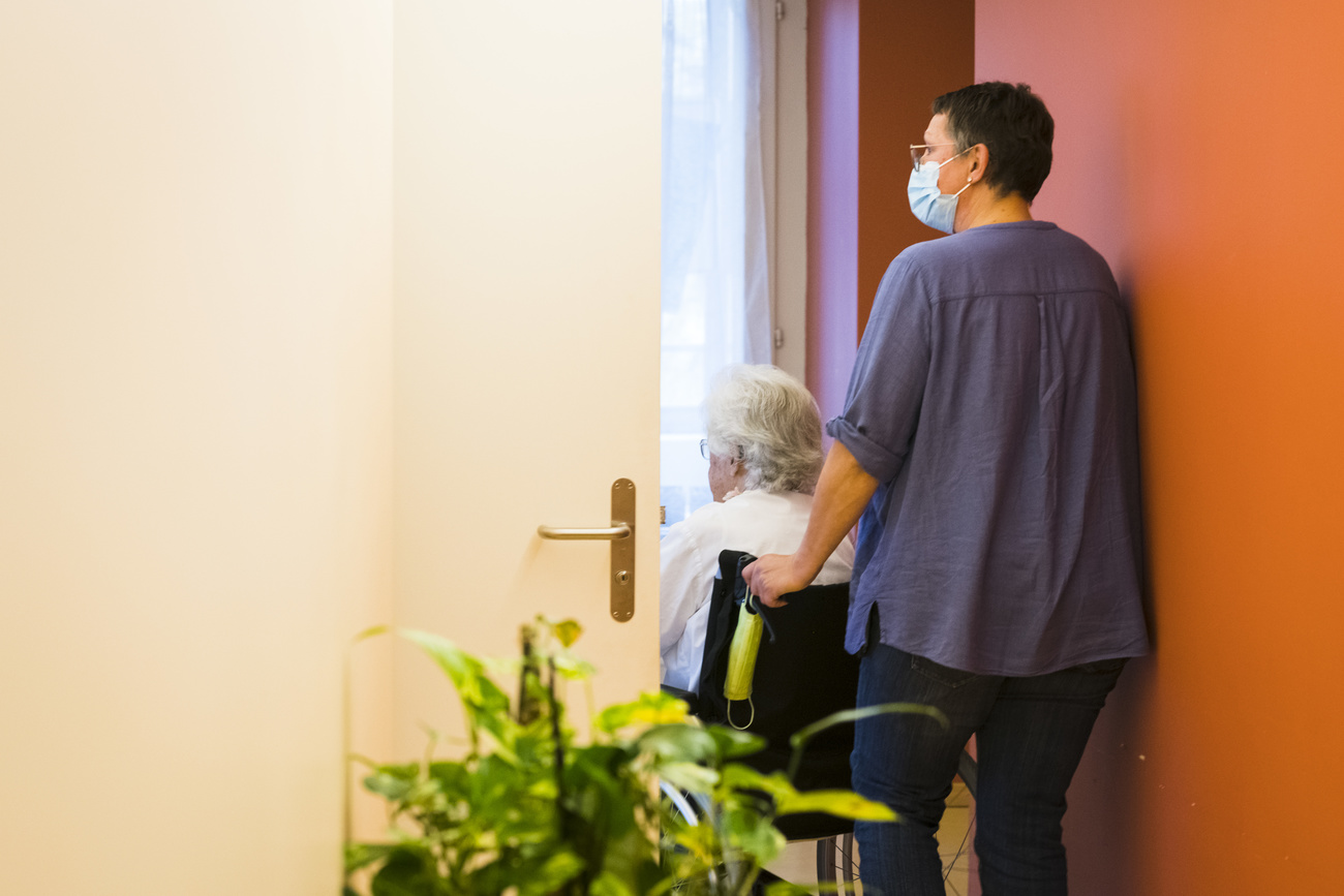 medical worker with elderly person