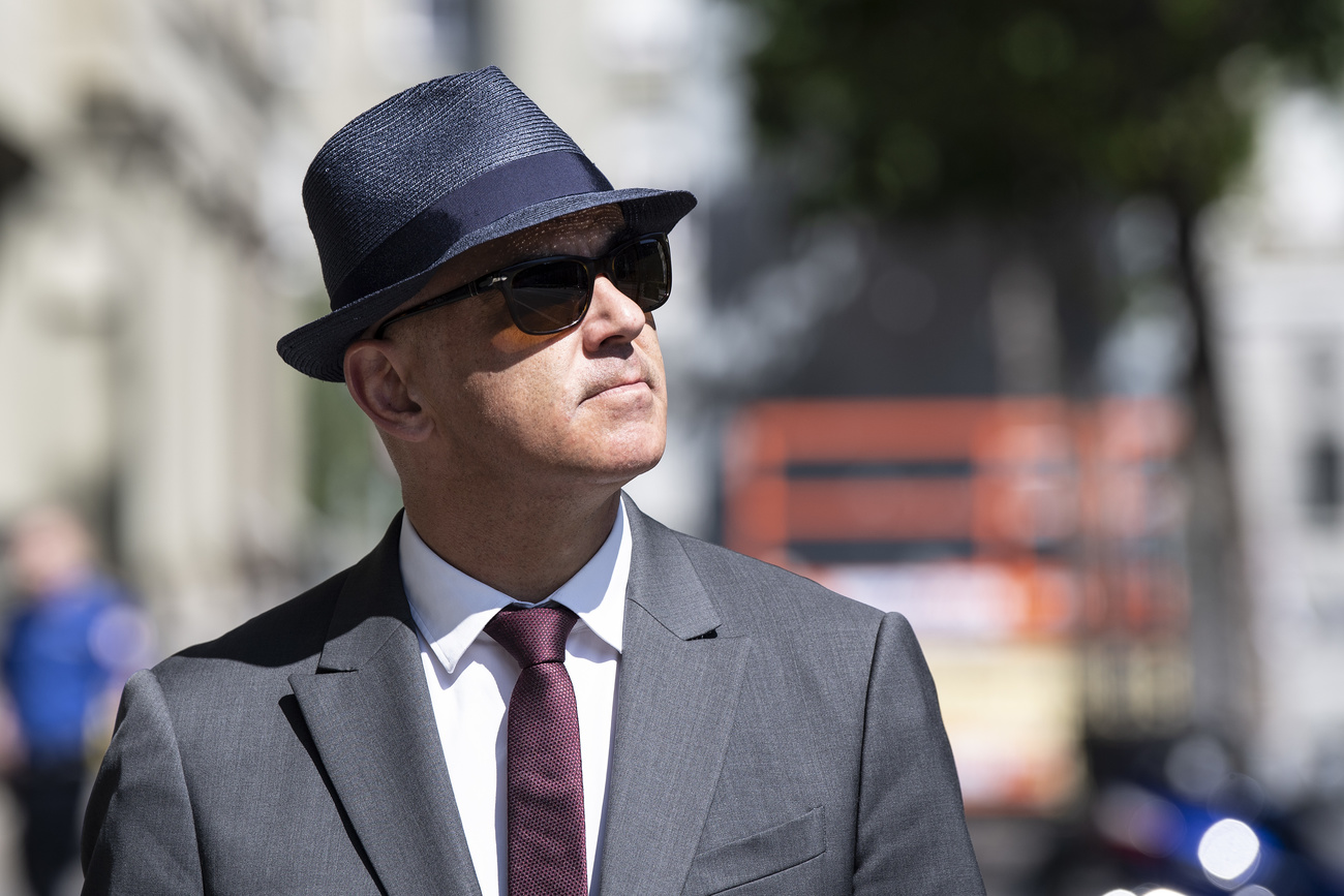 Man with hat and shades