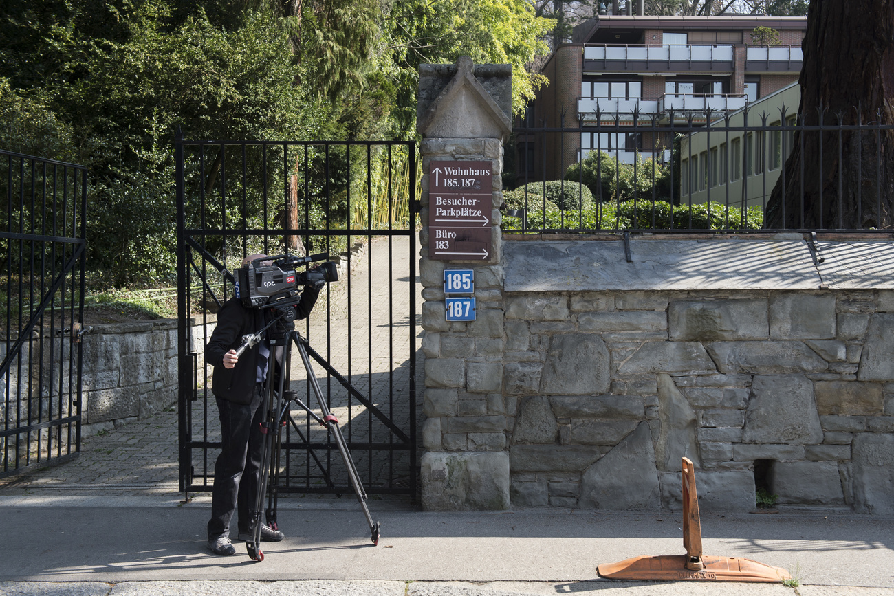 Cameraman outside Gazprombank in Zurich