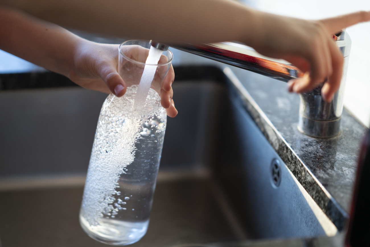 drinking water from tap