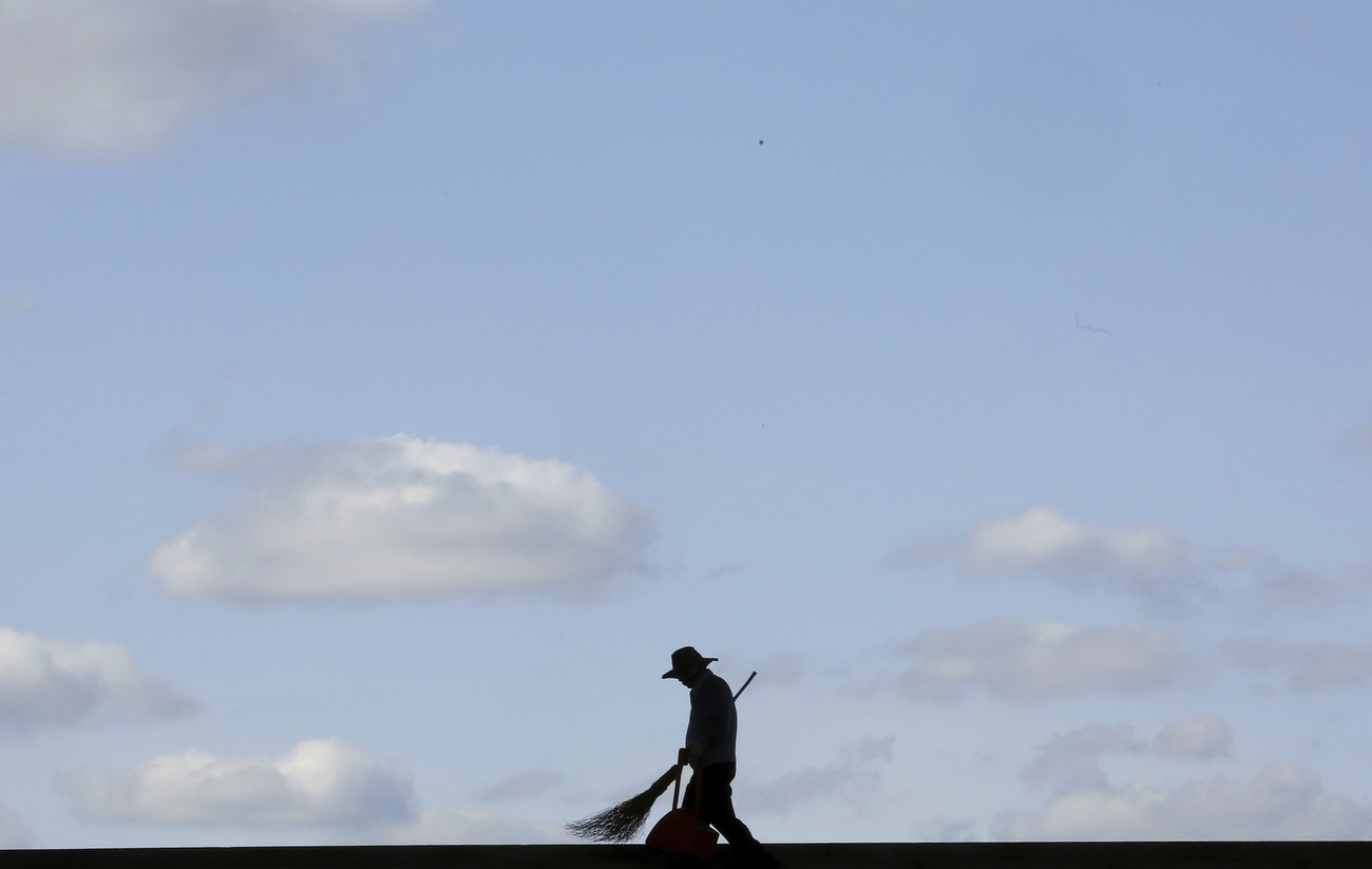 silhouette of cleaning man