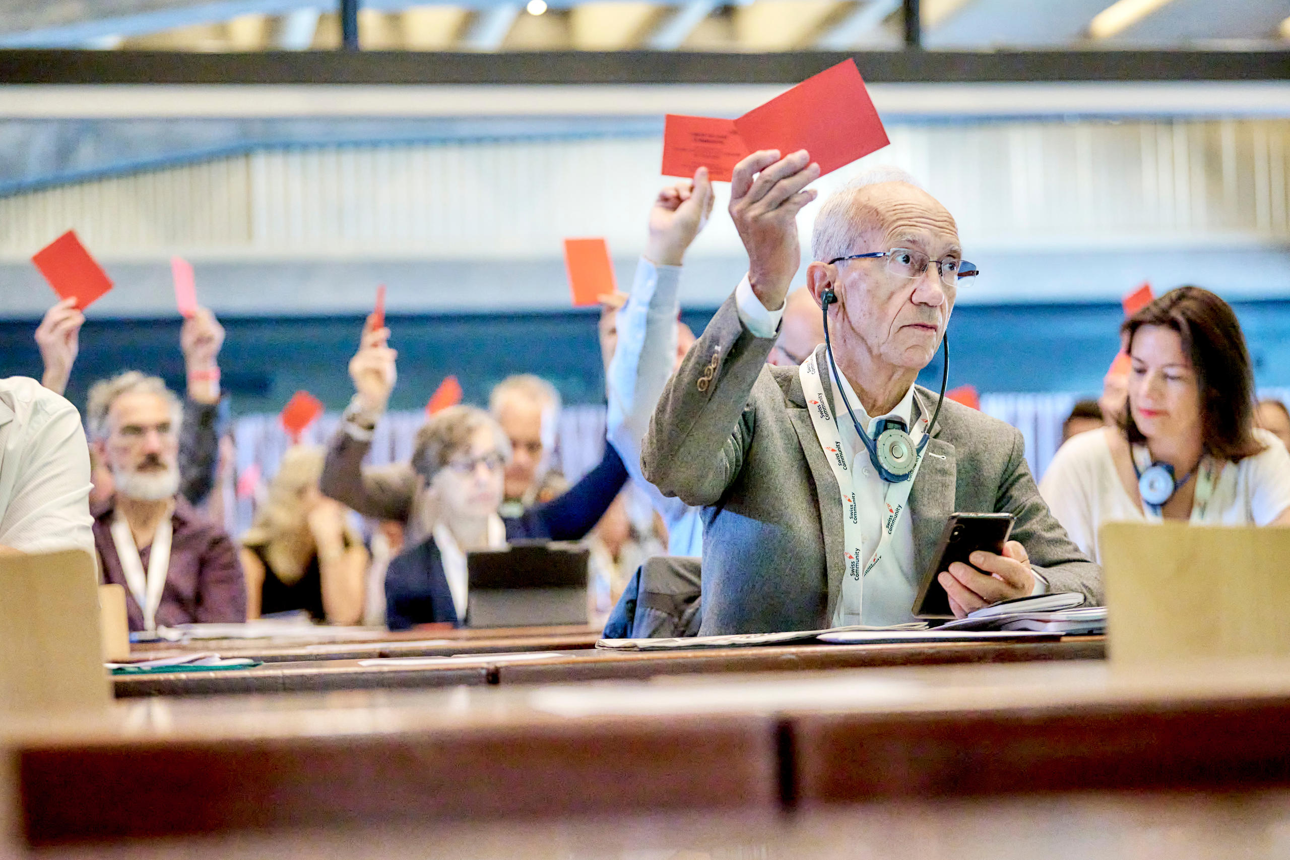 Delegates voting with cards