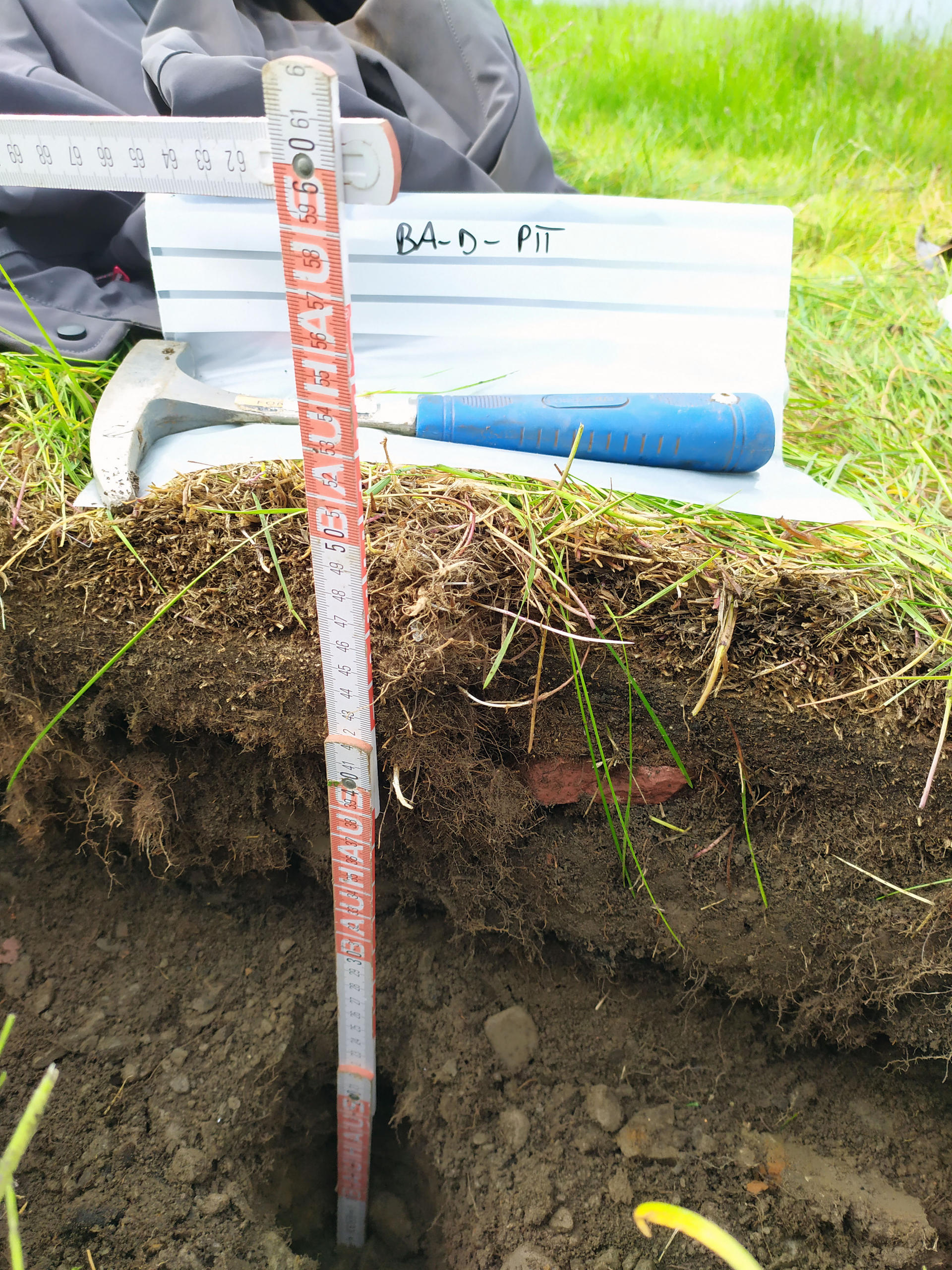 Typical soil pit of our sampling site in Barentsburg