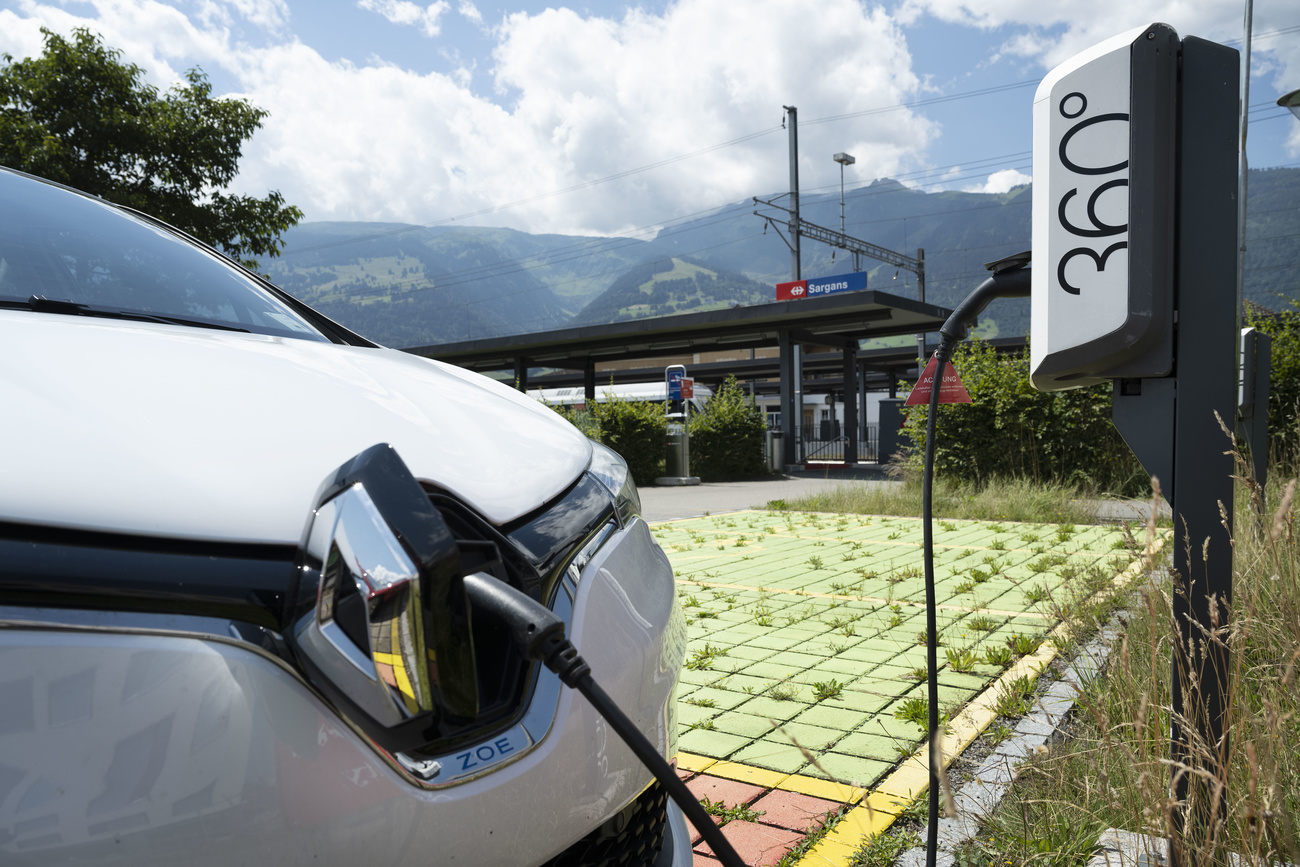 Plug-in car at a charging point