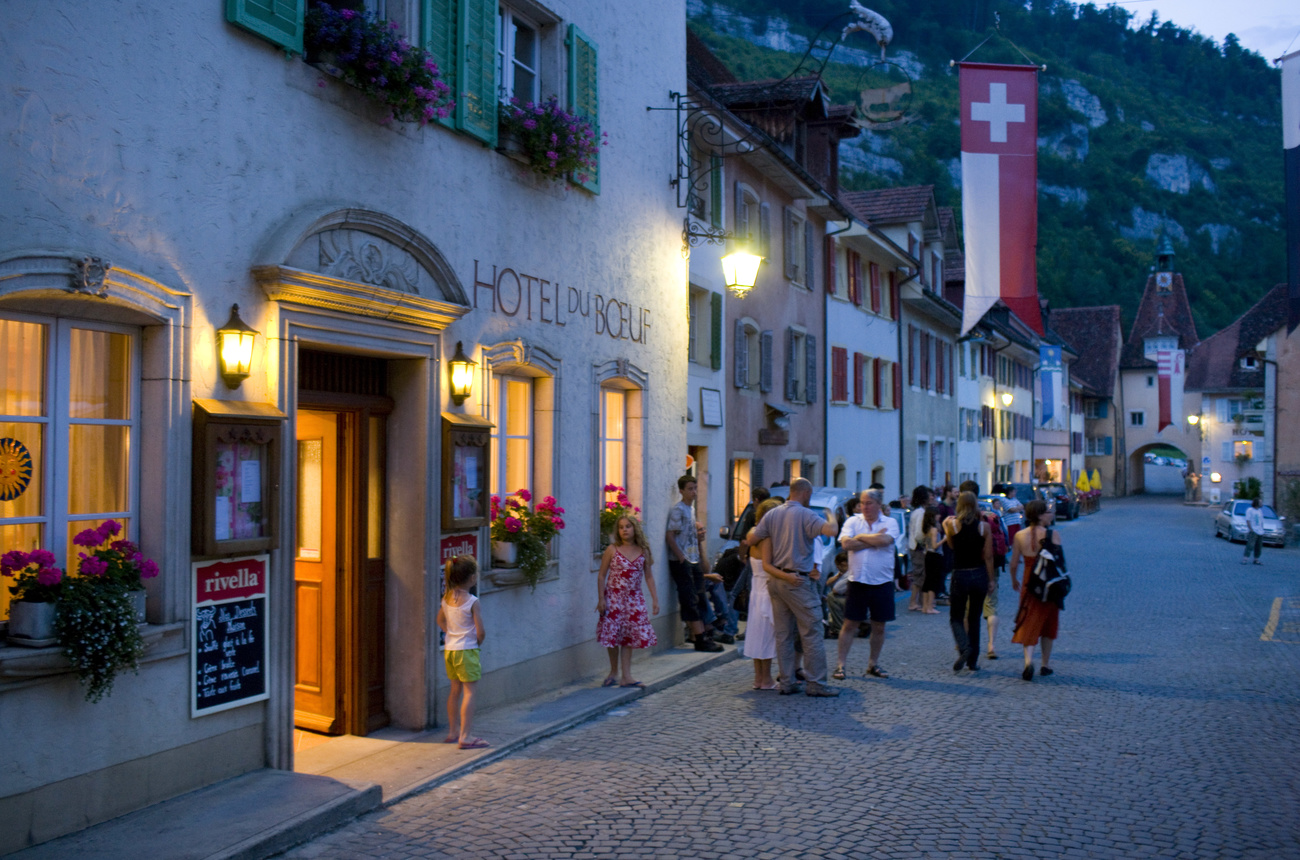 People in a cobbled street
