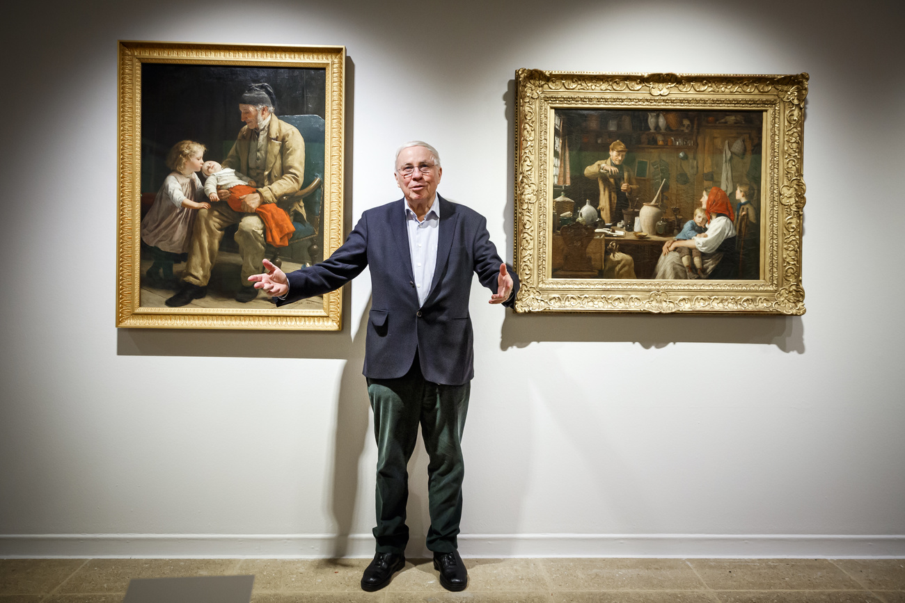 Christoph Blocher con dos cuadros de Albert Anker