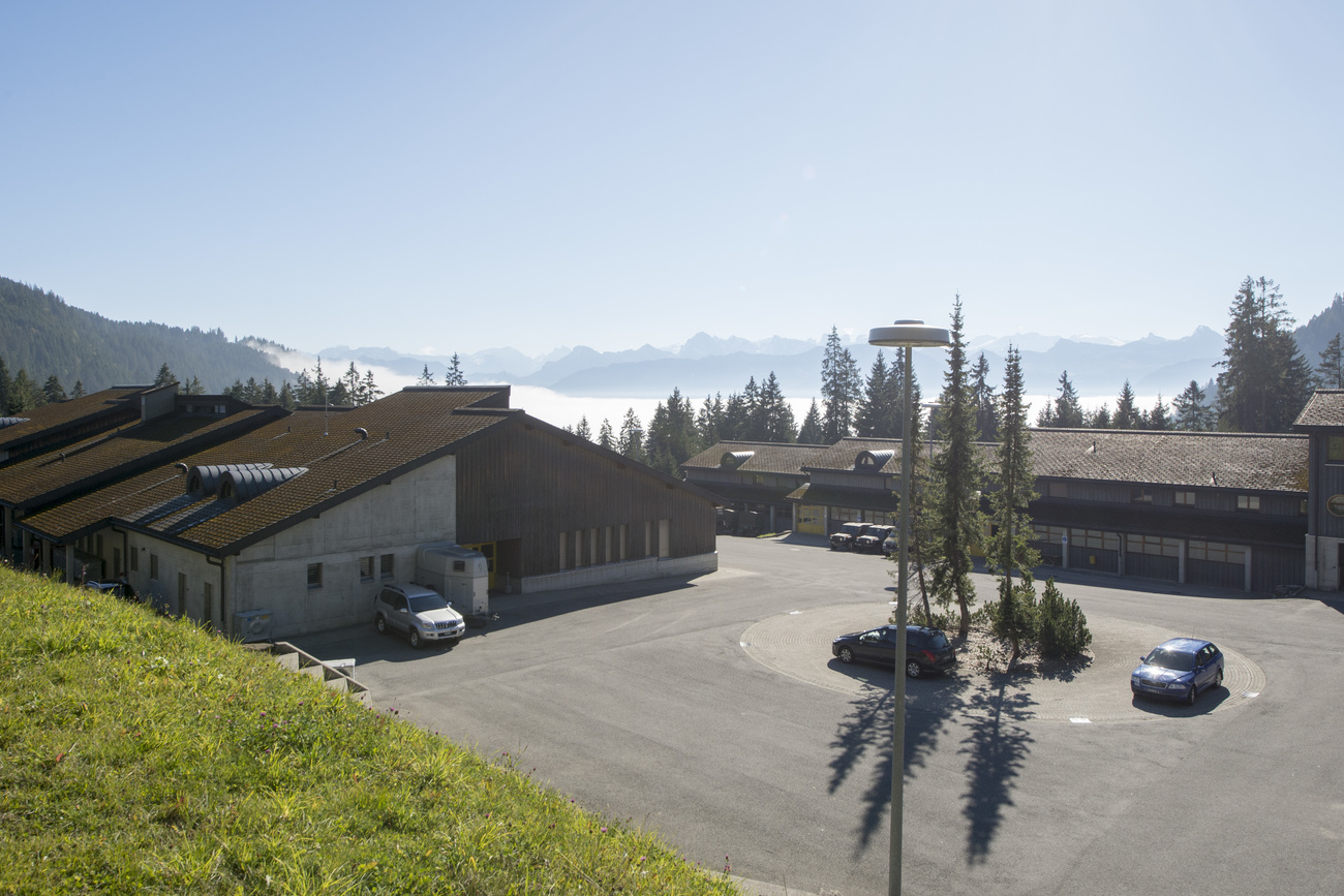 buildings overlooking mountains