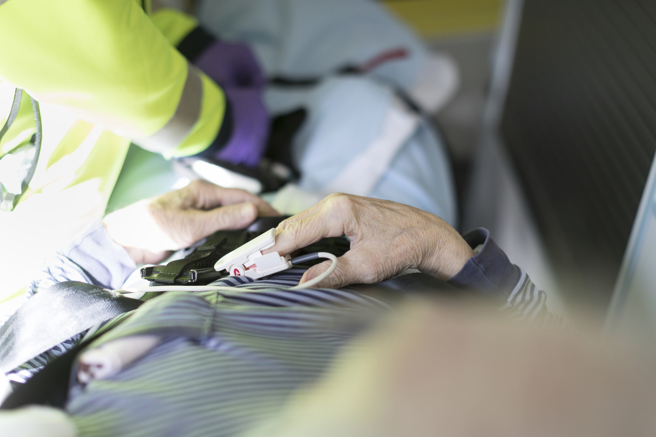 Elderly person in ambulance