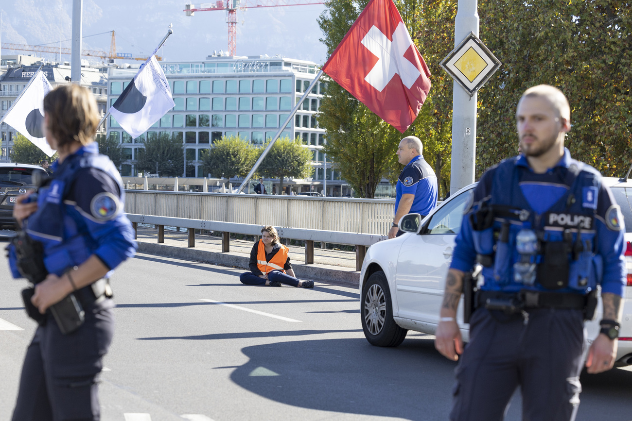 Climate activist glued to the road