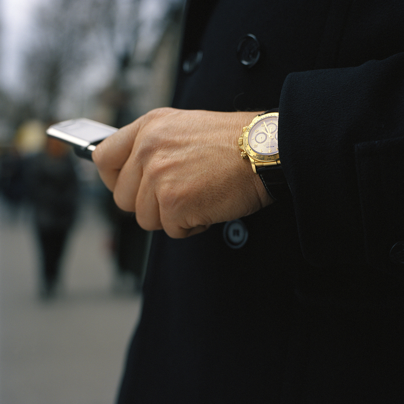 Man wearing Rolex watch