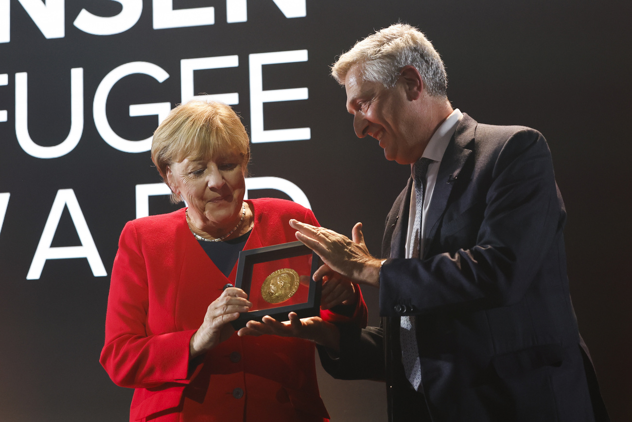 Merkel y Grandi