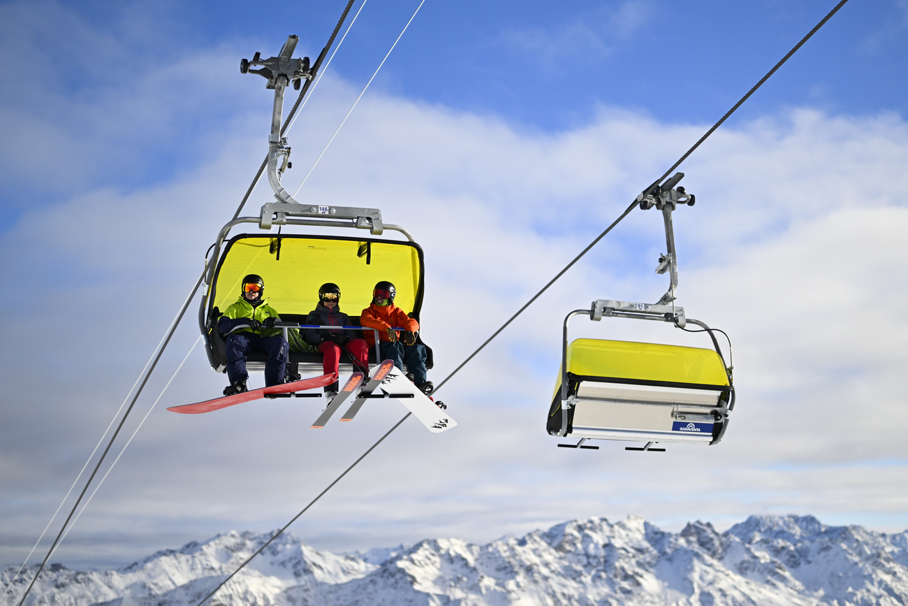 Skiers on lift