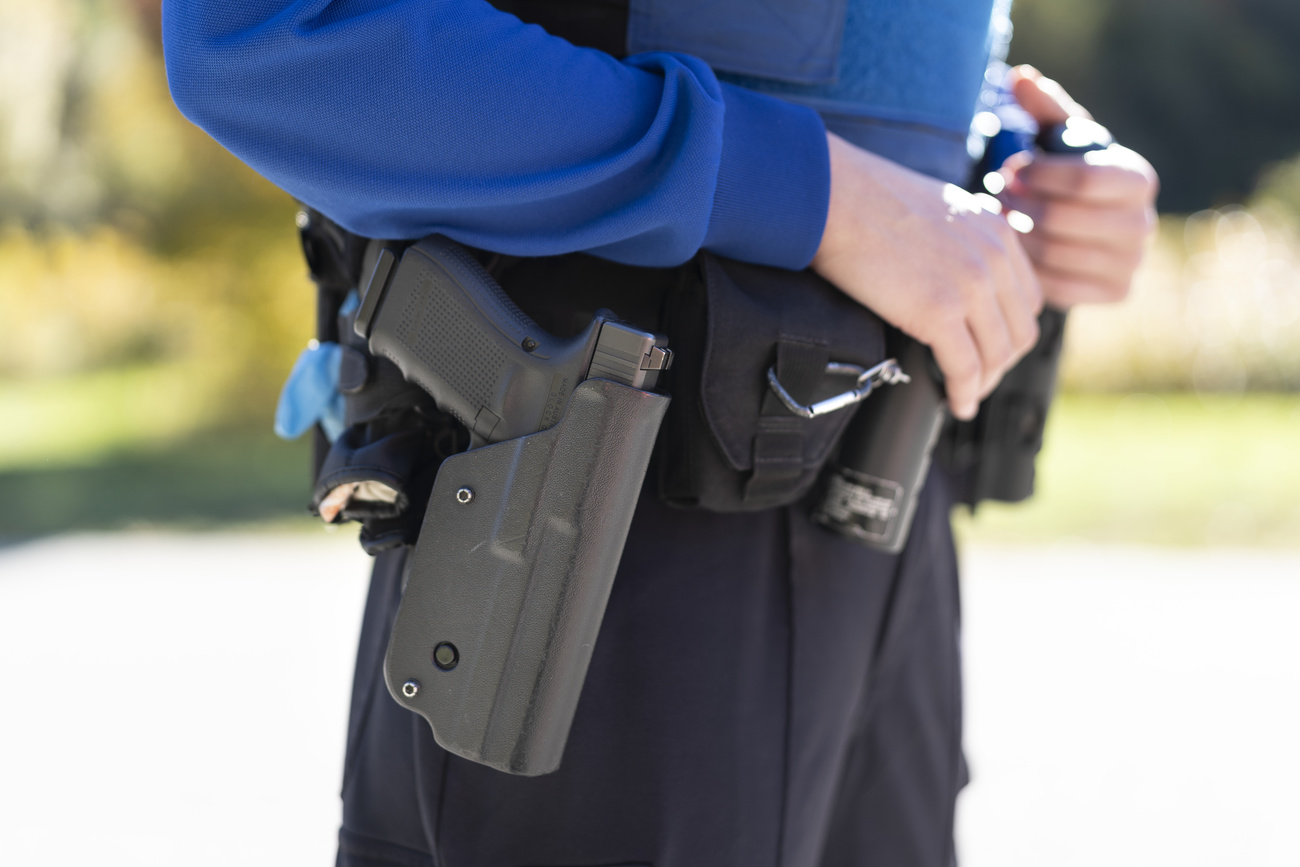 policeman and his gun