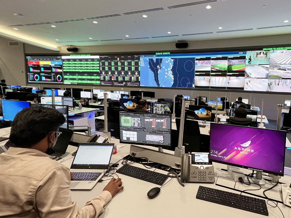 Staff work on March 28, 2022 at the Aspire security command centre for the FIFA World Cup Qatar 2022.