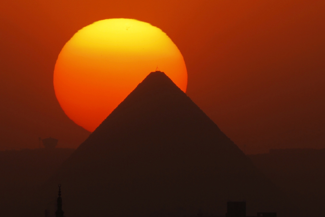 Sun sets on pyramid in Egypt