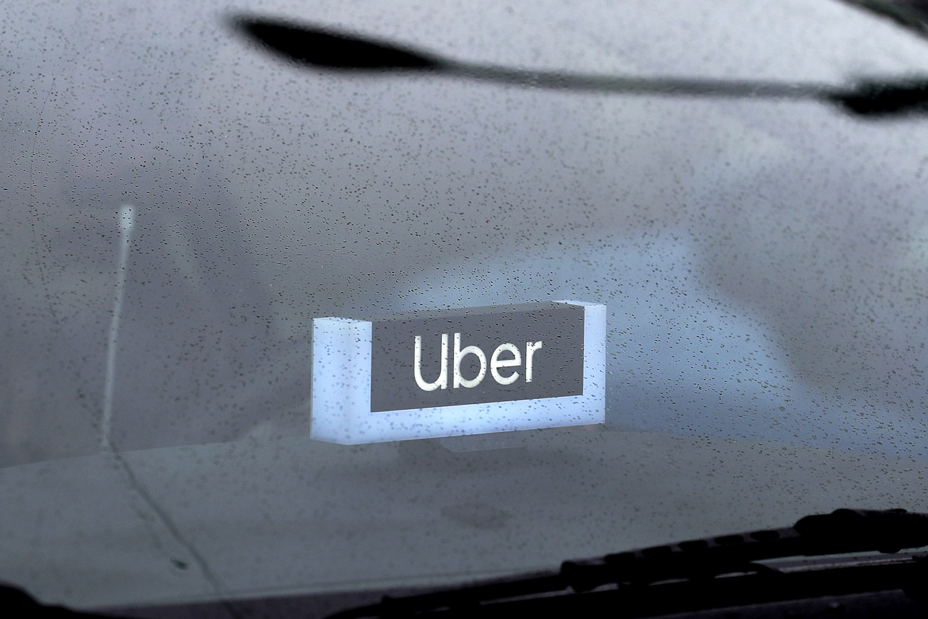 Uber sign in a car