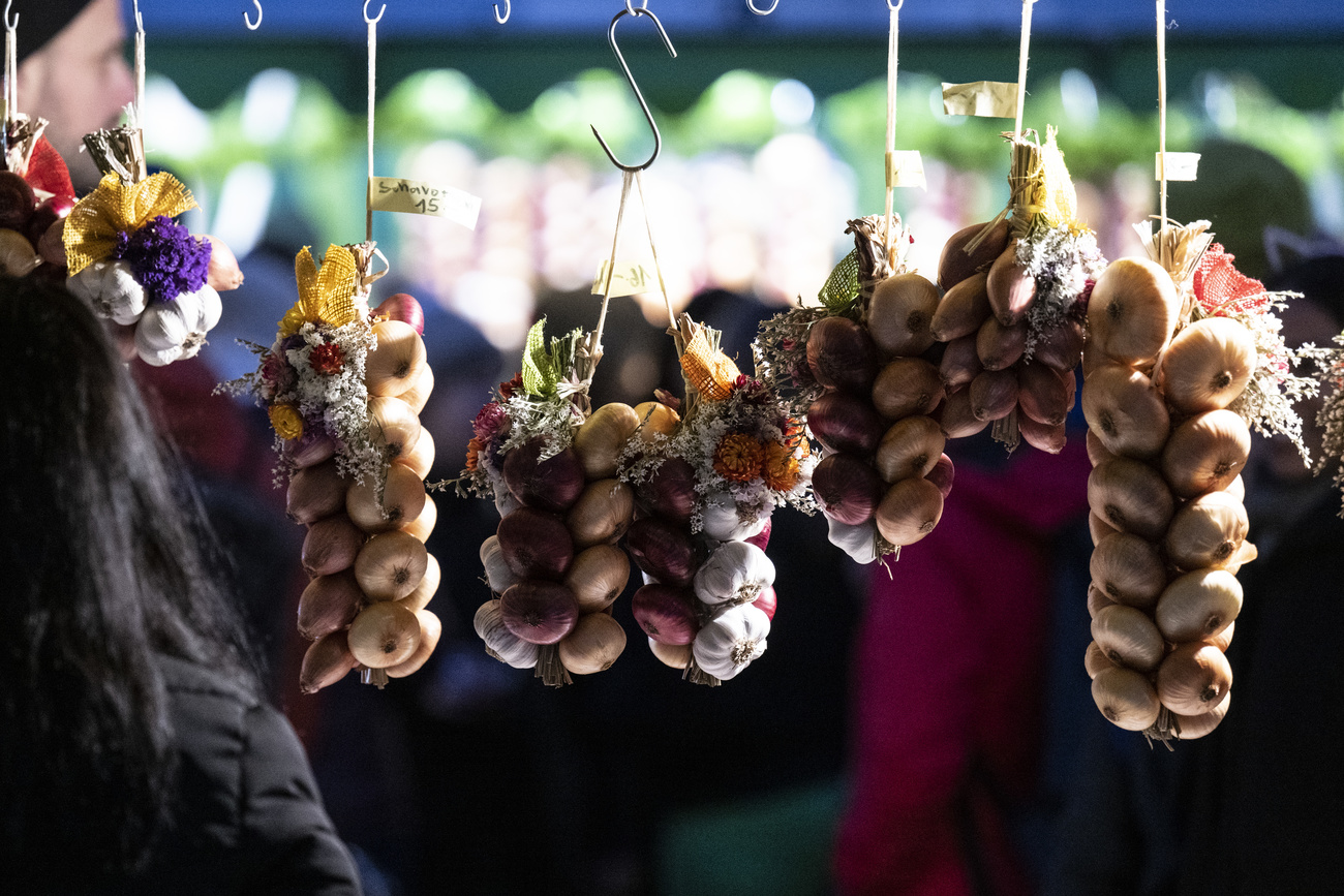 Onion braids hang at the Zibelmärit onion festival in Bern, Switzerland.