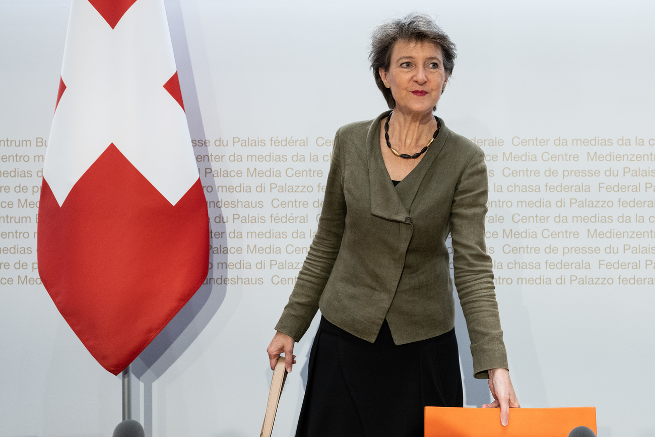Woman and Swiss flag