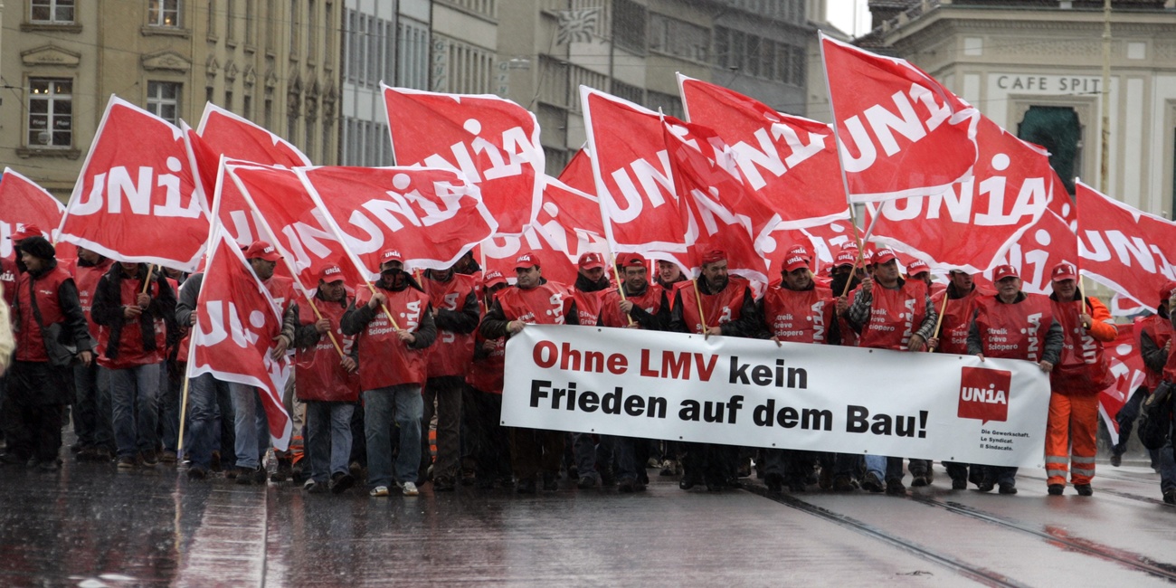 Demonstrators in street with flags