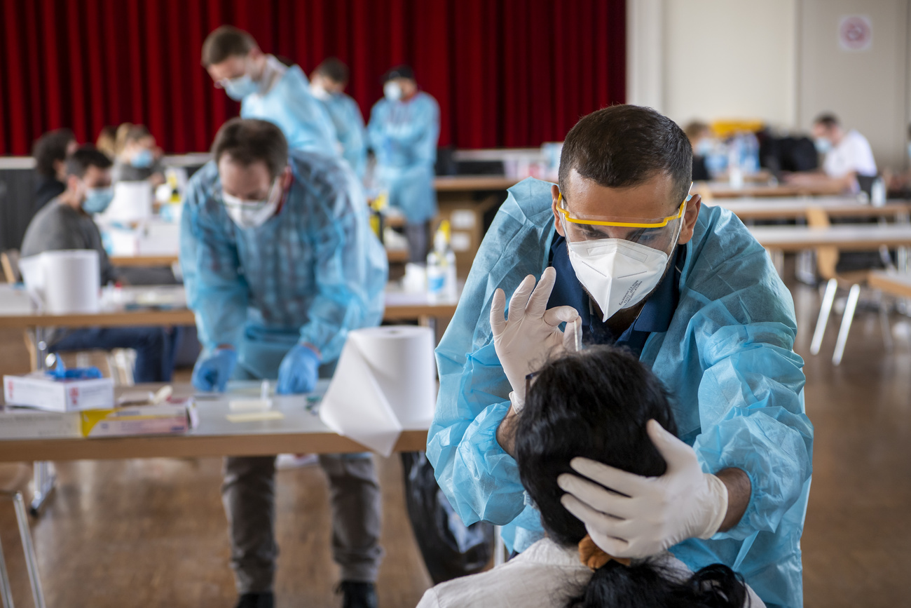 Man giving Covid test