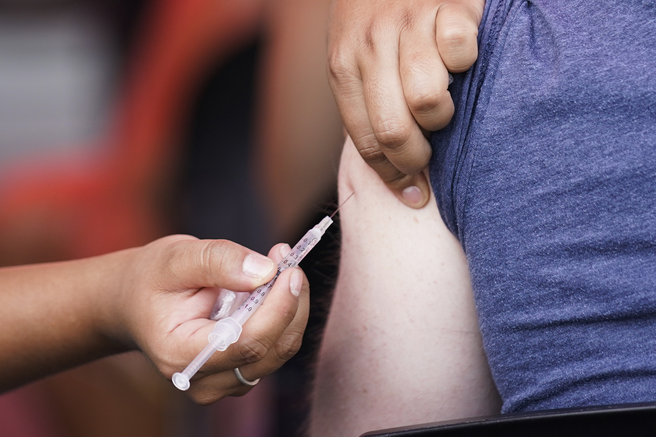 Monkeypox vaccine being injected into person s arm
