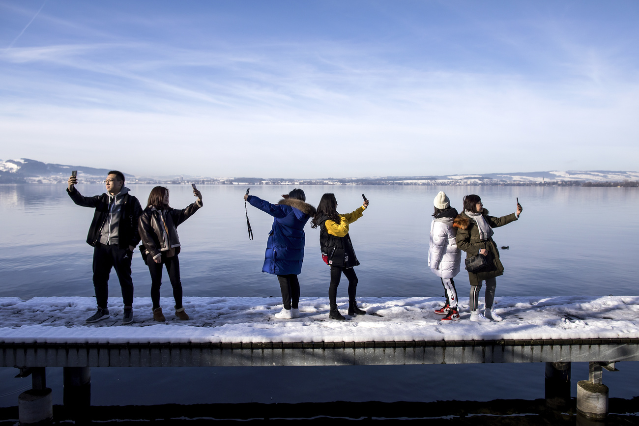 Tourists taking selfies