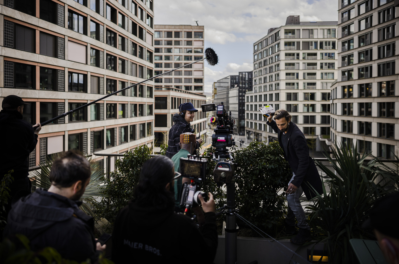 Film crew in urban setting