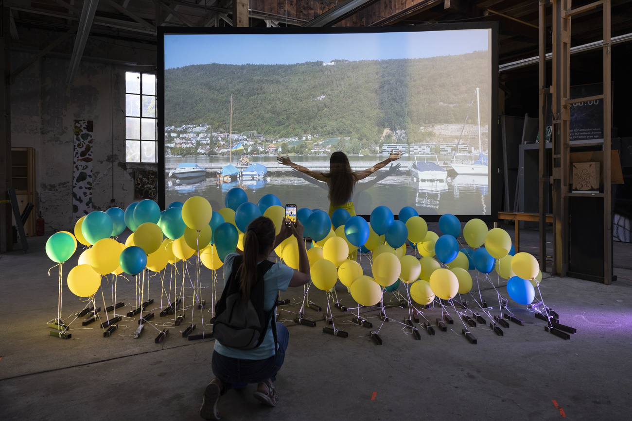 People posing with balloons