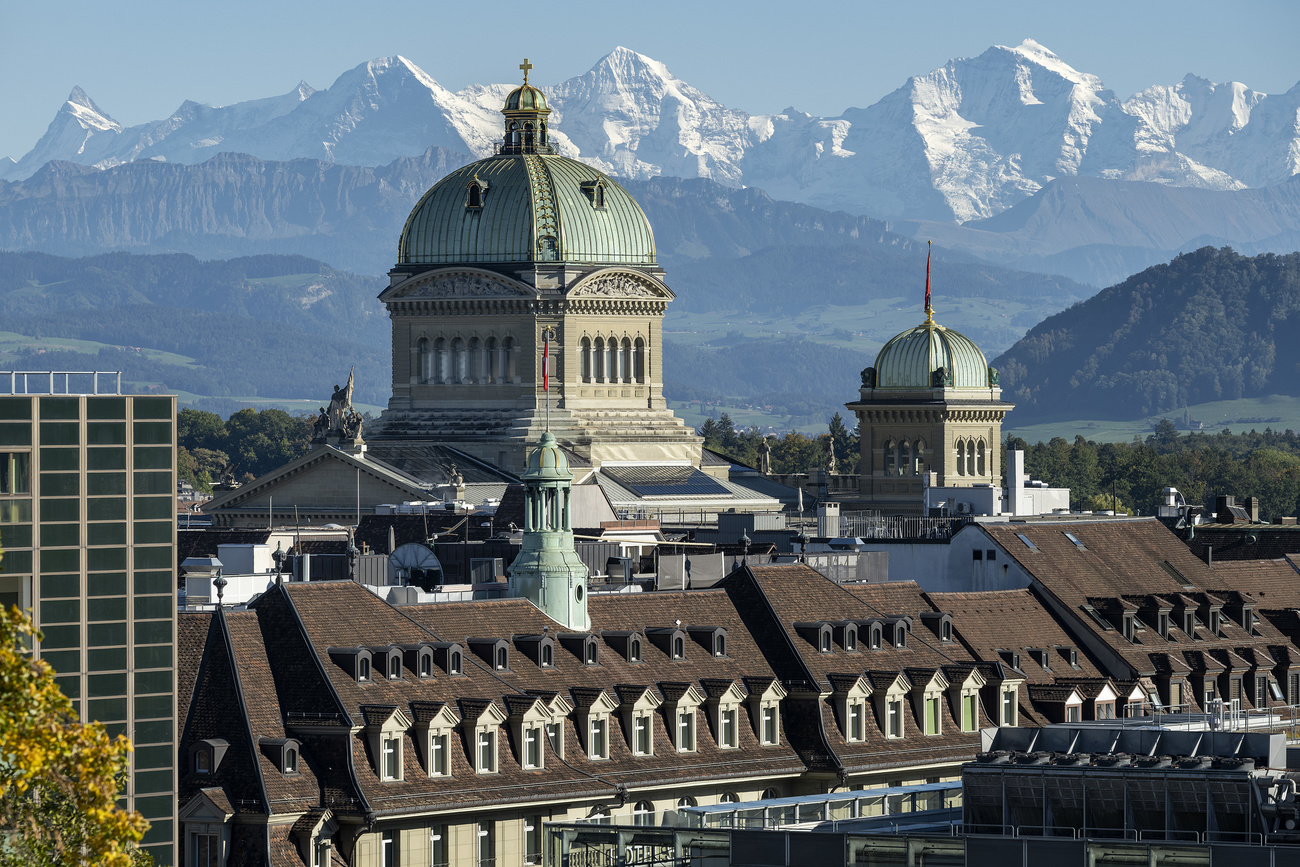 Swiss parliament and mountains