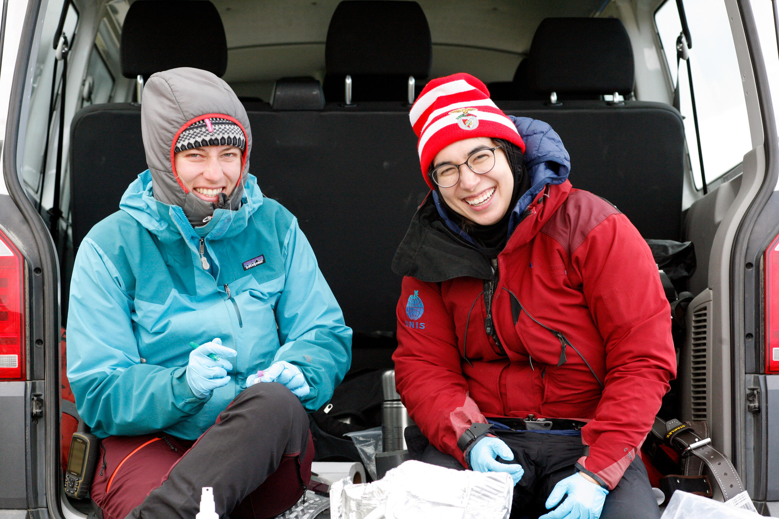 Lena and Cara working in the minivan lab, nicely protected from the wind and the rain