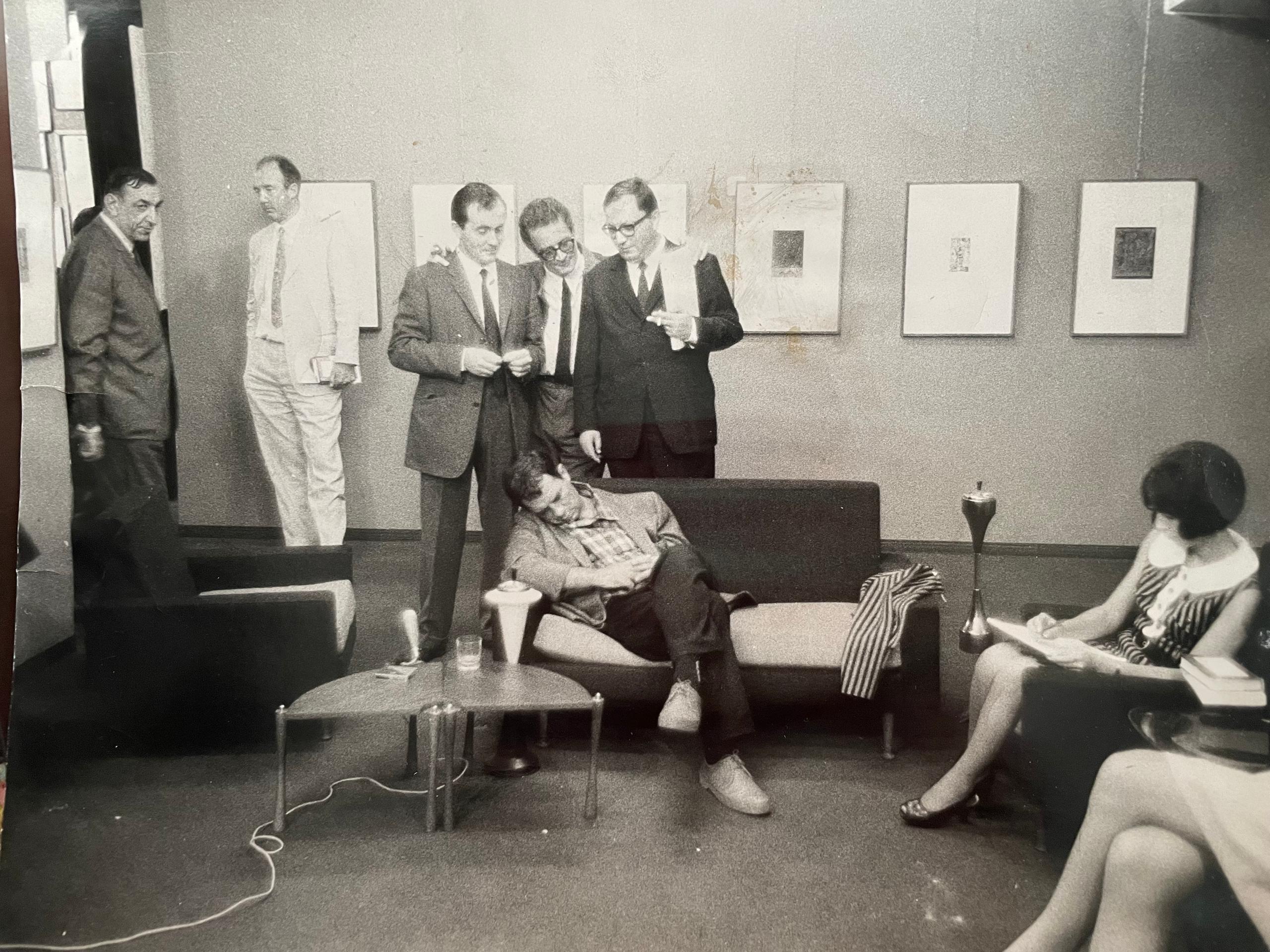 Kerouac sleeping in a reception