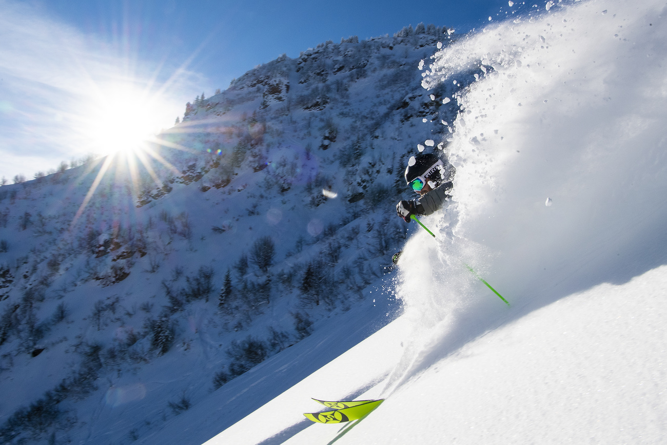 Person skiing in powder snow.