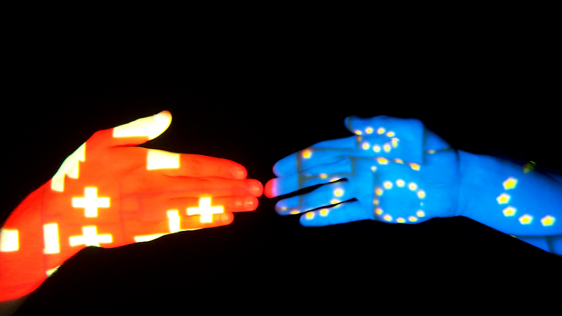 EU and CH flags on two hands about to shake