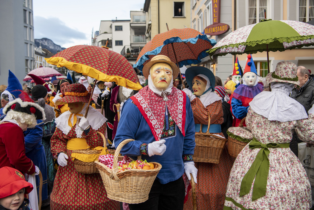 Procession of carnival-goers in Brunnen, Switzerland.